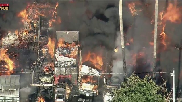 Several homes destroyed after massive fire breaks out at a Compton pallet yard