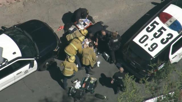 Off-duty LAPD officer shot after suspect breaks into his private vehicle
