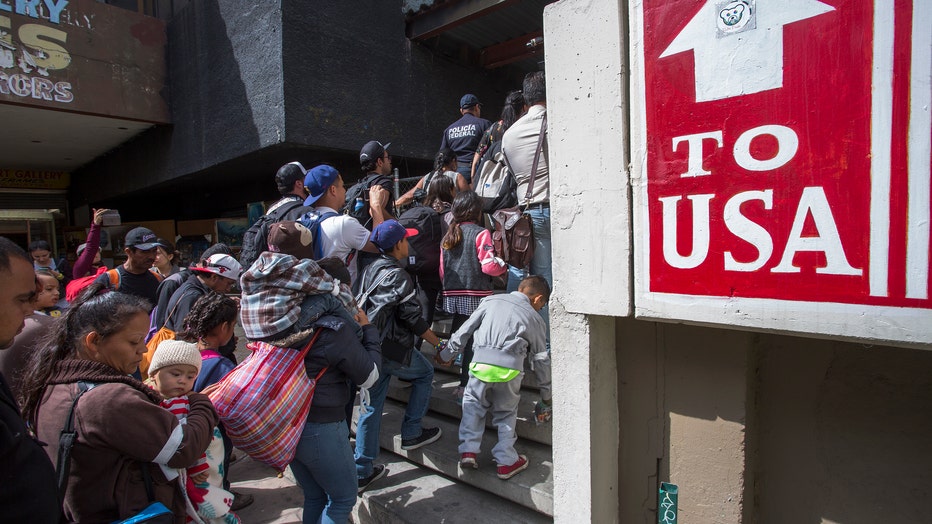 Migrants In Caravan That Travelled Through Mexico Attempt To Be Granted Asylum At U.S. Border