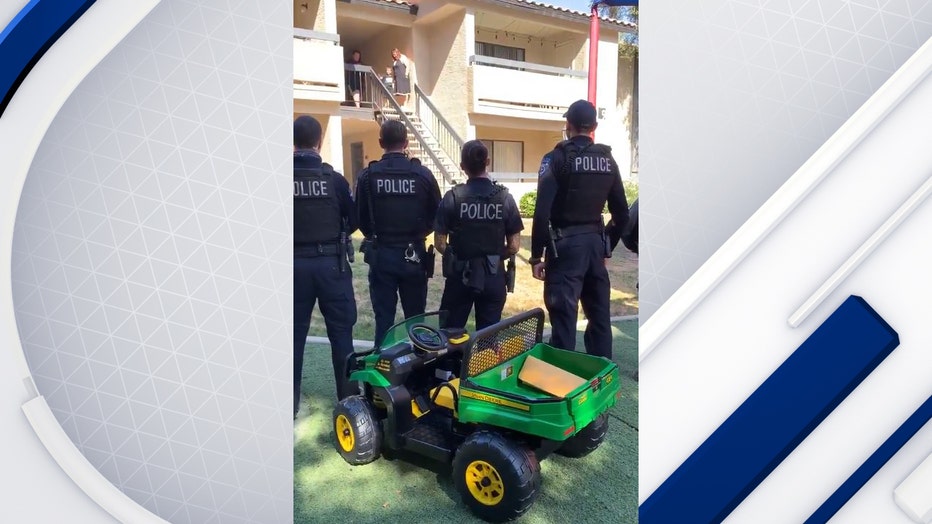 Tempe Police stand in front of gator tractor