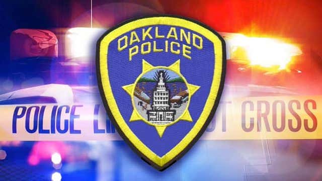 Father shot in face while holding child in Oakland