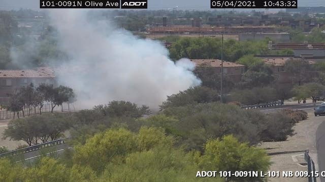 Car catches fire after crashing into Peoria canal