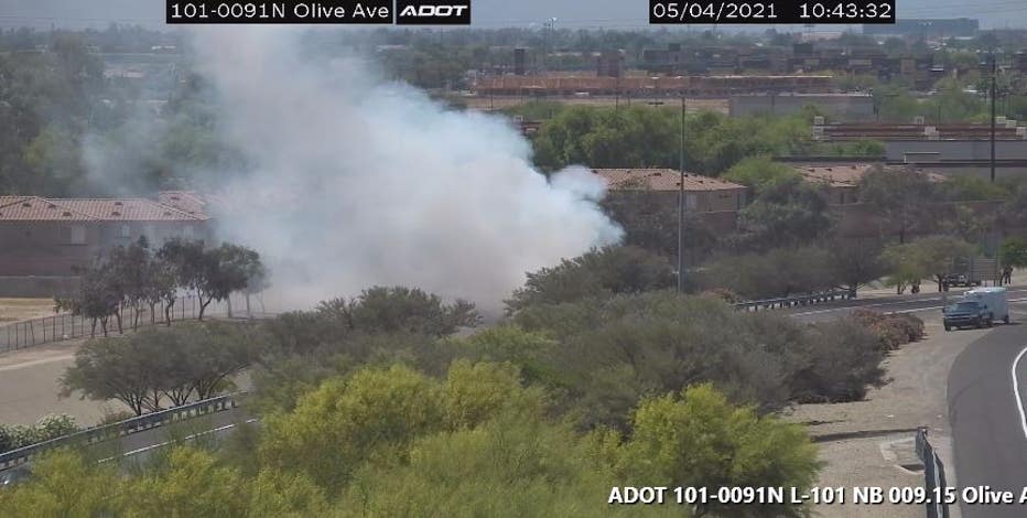 Car catches fire after crashing into Peoria canal