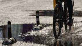 Girl falls off bike after lightning strike, is hit by car