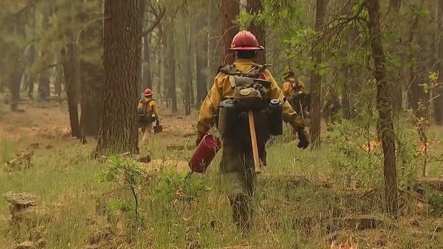 Fire crews battling the Rafael Fire work to stay steps ahead of the flames