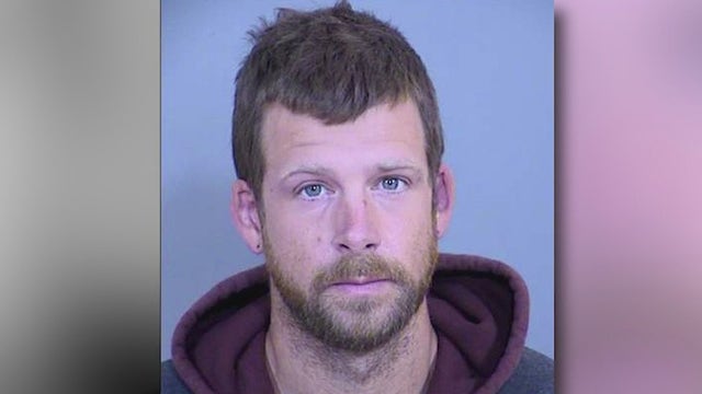 PD: Glendale man called officer racist slurs, spit on second officer's face