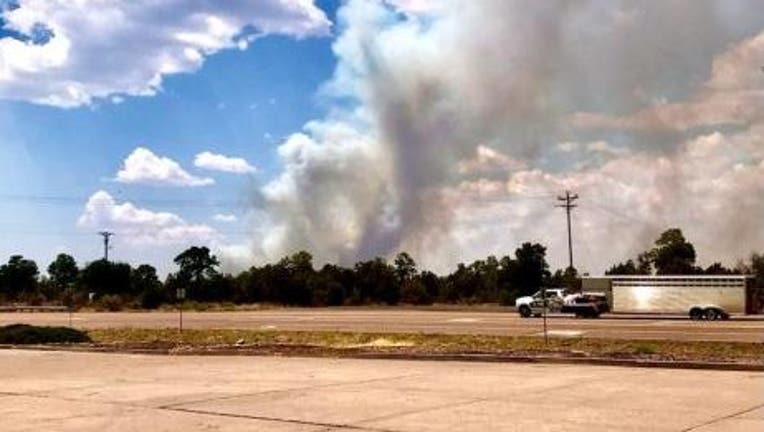 The Wyrick Fire is burning in the distance near Heber.
