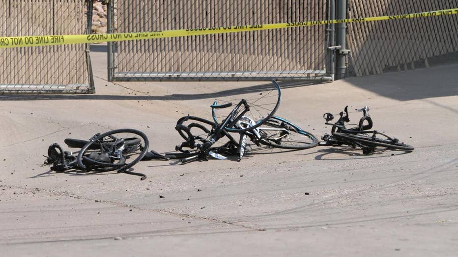 Crumpled bicycles laying on the ground