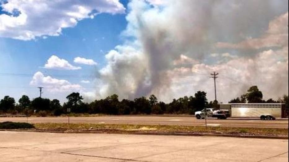 The Wyrick Fire is burning in the distance near Heber.