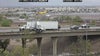 Jackknifed semi dangles over edge of I-17 in Phoenix