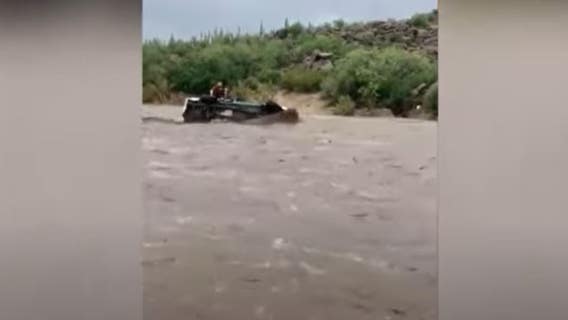 Shocking video: Group escapes floodwaters after car is washed away near Sycamore Creek