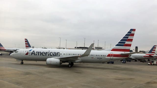 Group refusing to wear masks leads to 24-hour delay of American Airlines flight