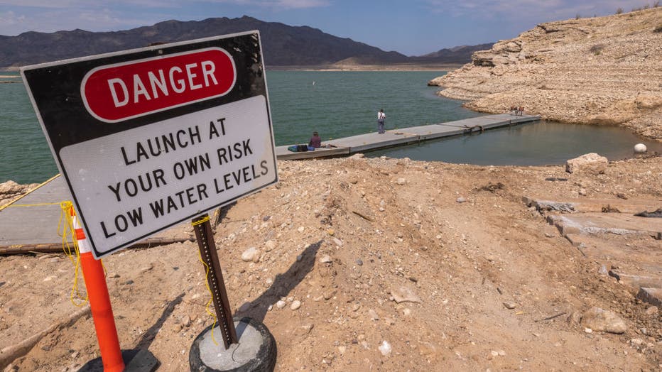 A dock, which has become unusable as worsening drought drops the water level of Lake Mead to new historic low records, is seen at South Cove near the upper reaches of the reservoir on June 29, 2021, near Meadview, Arizona. (Photo by David McNew/Getty Images)