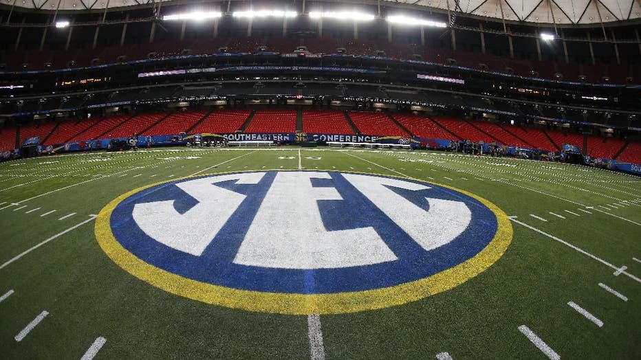 SEC logo football field