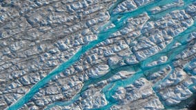 Rain falls atop Greenland's ice sheet for first time on record