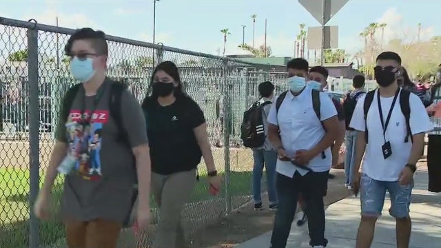 Parents express their worries over latest COVID-19 surge as students return to school