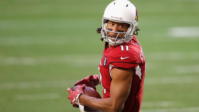 Larry Fitzgerald makes a reception against the San Francisco 49ers during a game in December 2020.