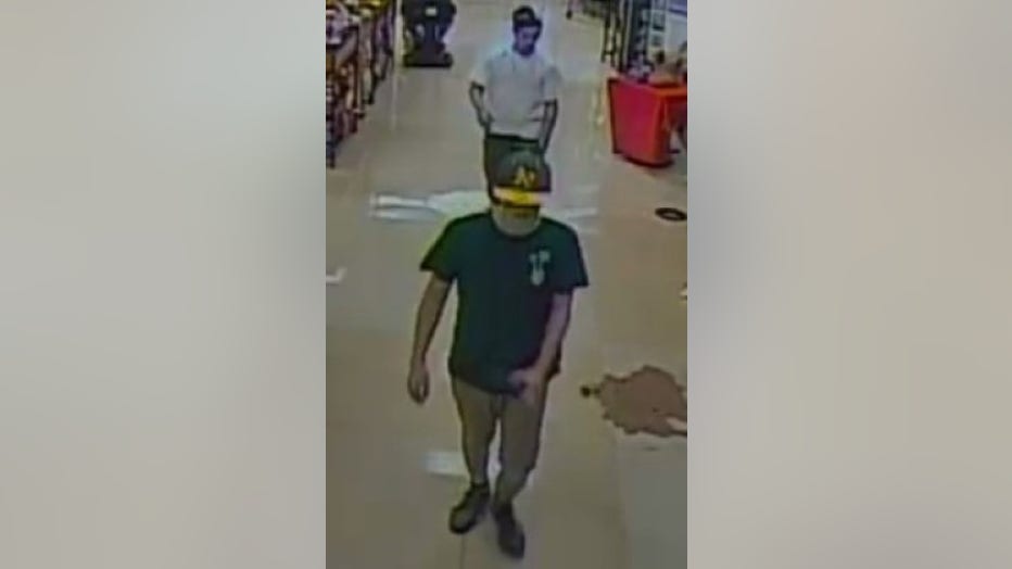 Police say the suspect is one of the three people shown in this photo.