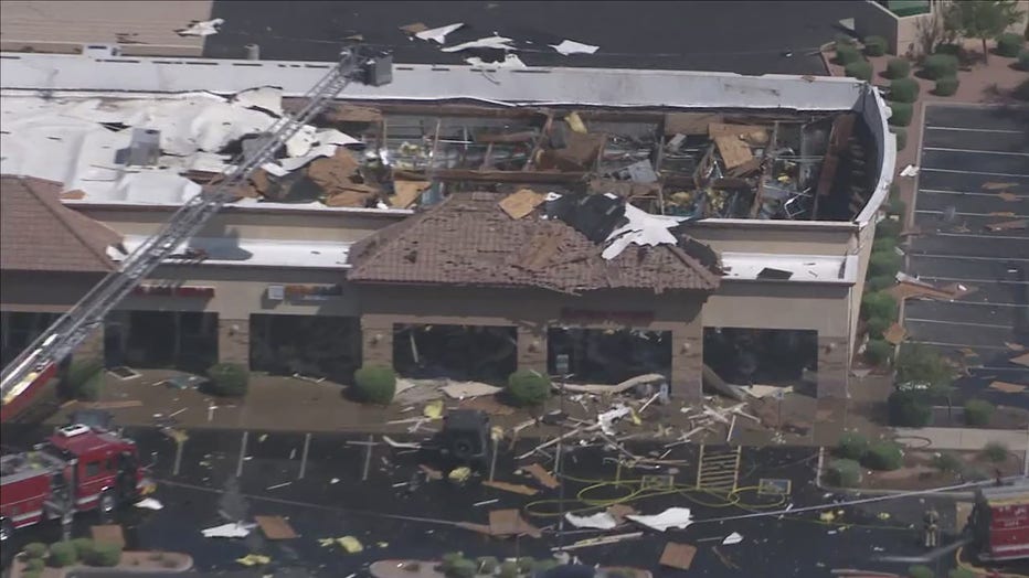 Screenshot of photo taken by SkyFOX in August 2021, showing extensive damage sustained by a business as a result of an explosion