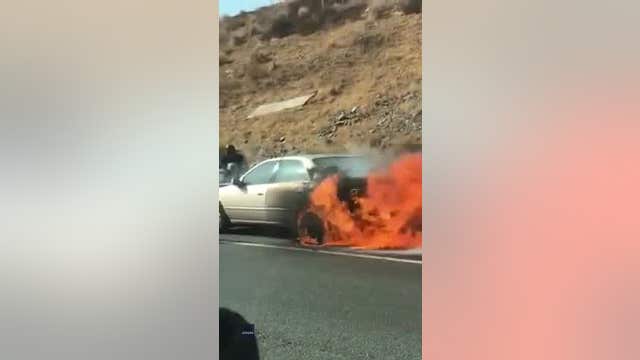 Good Samaritans pull elderly couple from burning car in Southern California