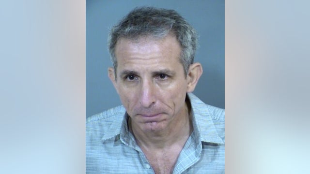 PD: DUI driver runs a red light, injures Phoenix Police officer