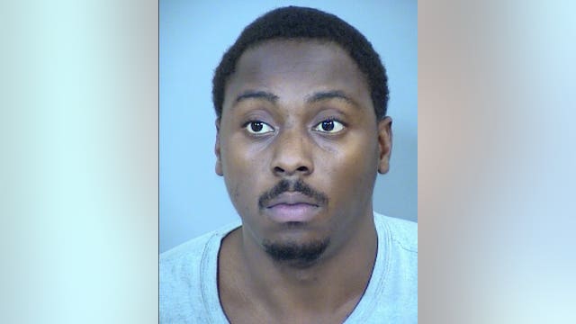 Suspect arrested after man shot in car during north Phoenix robbery in August