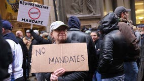 Iowa governor signs COVID-19 vaccine mandate exemption into law