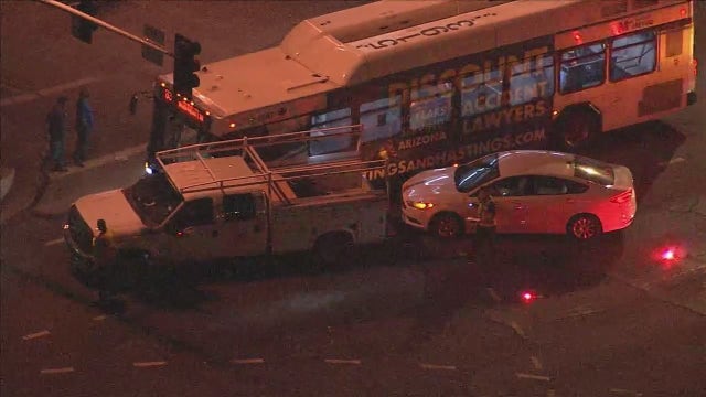 Bus, work truck collide in west Phoenix – police investigating