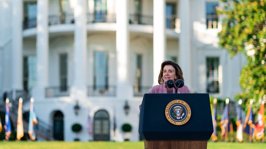 Speaker of the House Nancy Pelosi (D-CA) gives remarks before President Joe Biden signs the Infrastructure Investment and Jobs Act