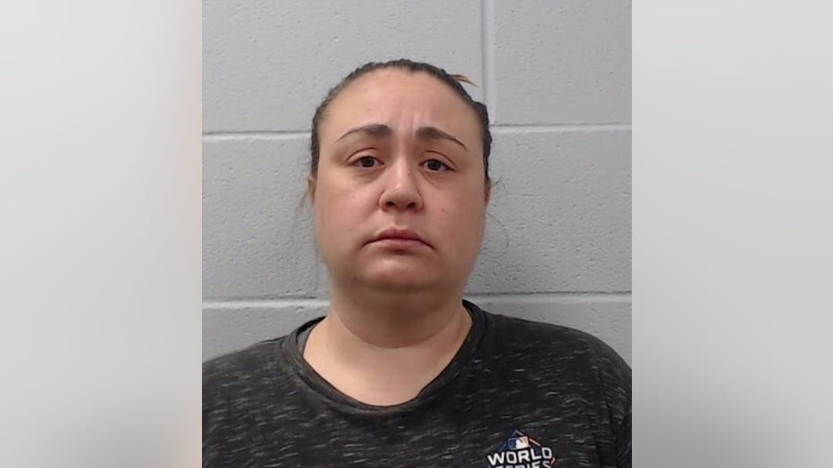 35-year-old Monica Bradford has been arrested for pointing a loaded gun at a seven-year-old who was trick-or-treating on her street on Halloween.