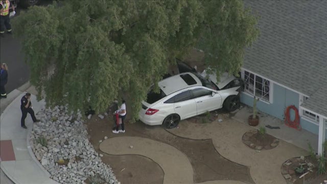 Car crashes into Phoenix home, injuring several teenagers
