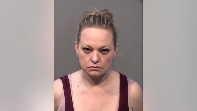 Woman arrested, accused of robbing Prescott shoe store employees at gunpoint