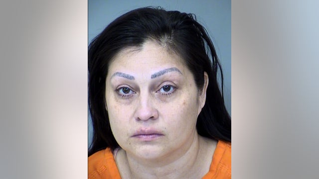 Woman accused of shooting 2, killing 1 outside her Peoria home