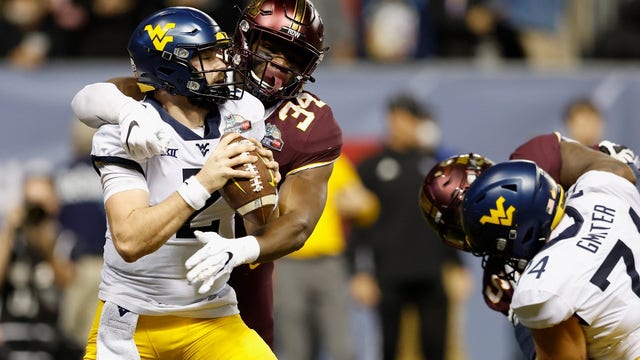 Gophers pound West Virginia 18-6 to win Guaranteed Rate Bowl, finish 9-4