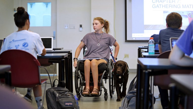 1-mariel-rolling-in-classroom-photo-aaron-daye-scaled