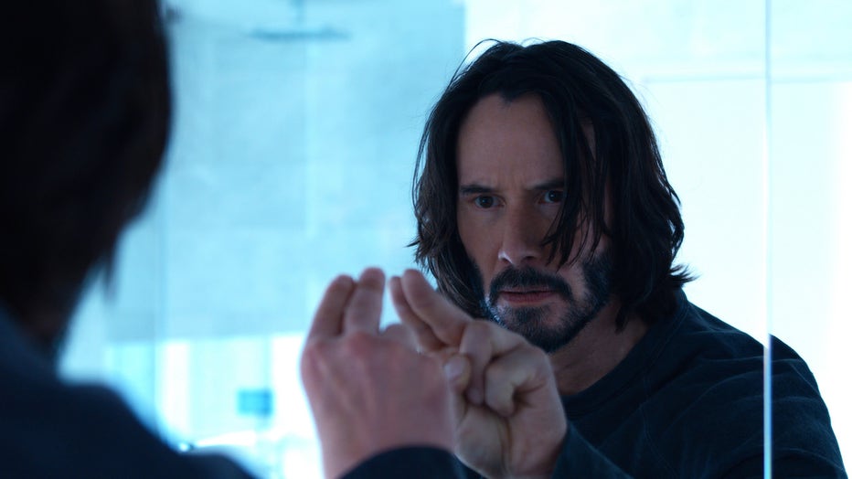 KEANU REEVES as Neo/ Thomas Anderson in Warner Bros. Pictures, Village Roadshow Pictures and Venus Castina Productions’ 