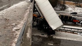 Tractor-trailer falls from icy North Carolina overpass after driver loses control