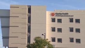 Amid new surge in cases, Dignity Health to allow employees experiencing mild COVID-19 symptoms to keep working