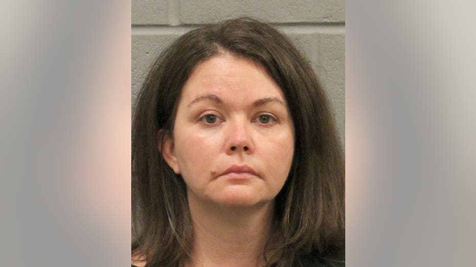 Sarah Beam, 42, is charged with child endangerment after her COVID-19 positive teen son was found in the trunk of her car at a Houston-area testing site.