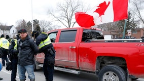 Trucker protests: Police arrest protesters blocking US-Canada bridge