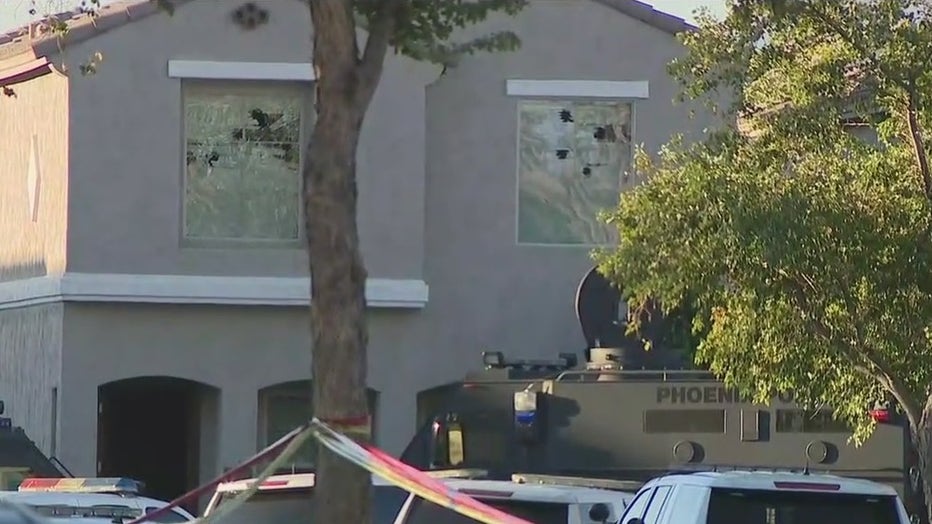 Windows were shot out during the standoff.