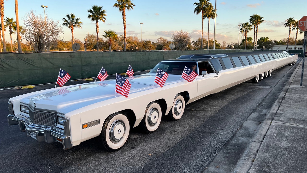 Indulge in the Extravagance of a 26-Wheel Stretch Limo with Helipad and ...