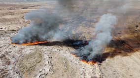 Crews work to contain brush fire north of Casa Grande