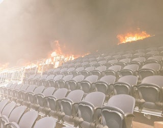 Dramatic images show fire erupting inside Denver's Mile High Stadium