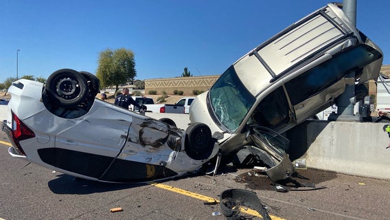 Tire blowout on Loop 101 in Glendale causes rollover crash, sends van into light pole