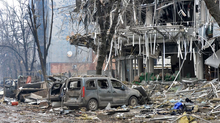 A view of damaged building after the shelling is said by Russian forces in Ukraine's second-biggest city of Kharkiv on March 3, 2022. (Photo by SERGEY BOBOK/AFP via Getty Images)