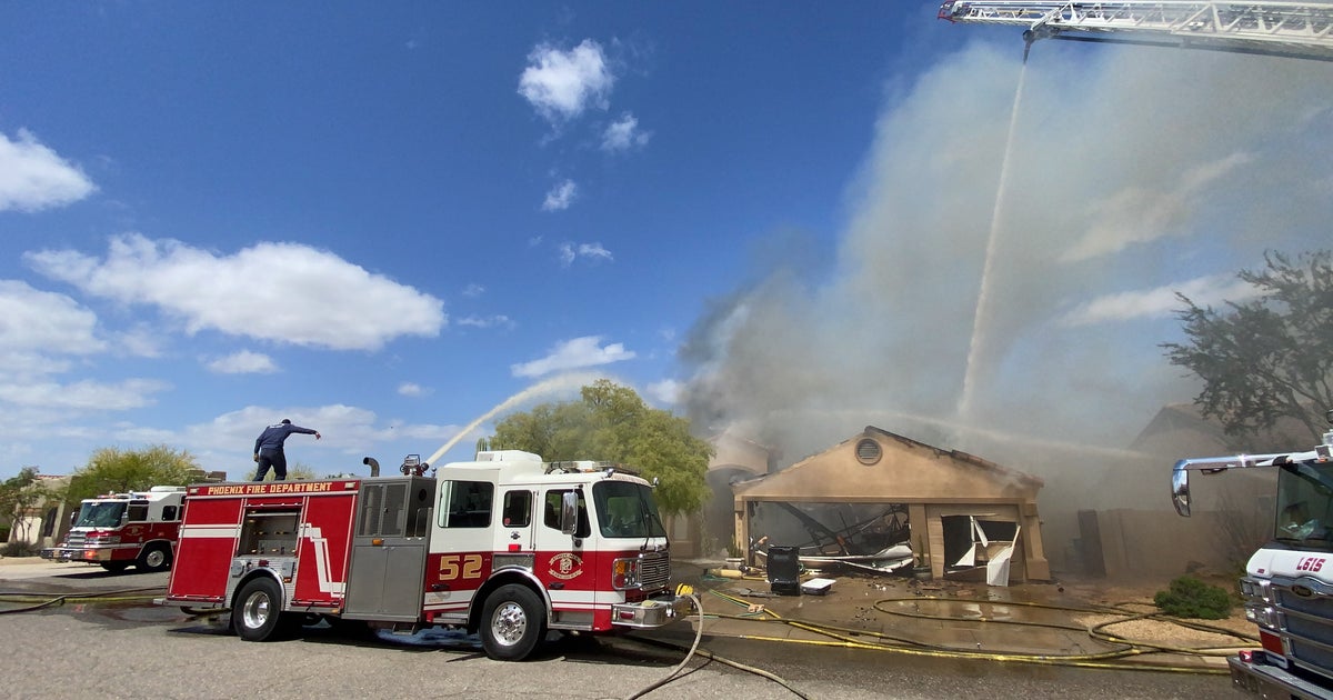 Firefighter rescued after getting trapped in north Phoenix house fire ...