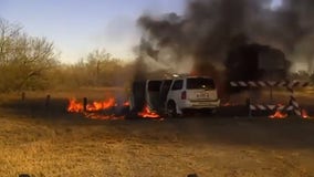 Agents rescue smuggled woman from duffel bag in burning car