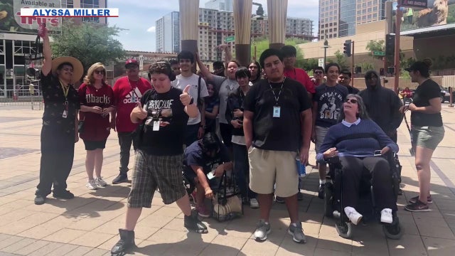 Arizona high school teacher with quadriplegia honored for helping to give back to the community