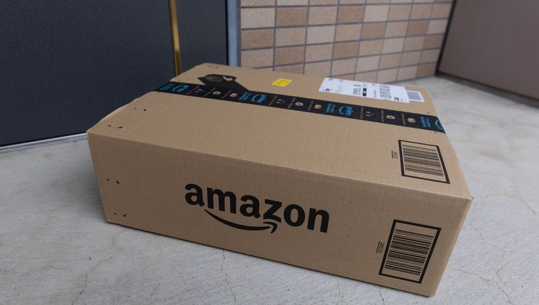 An Amazon delivery package seen in front of a door. (Photo by Stanislav Kogiku/SOPA Images/LightRocket via Getty Images)